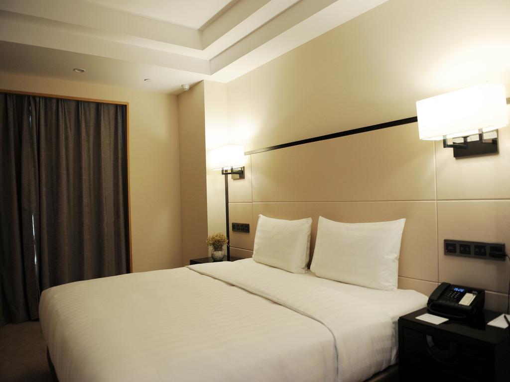 Готель Pullman Qingdao Ziyue Екстер'єр фото
