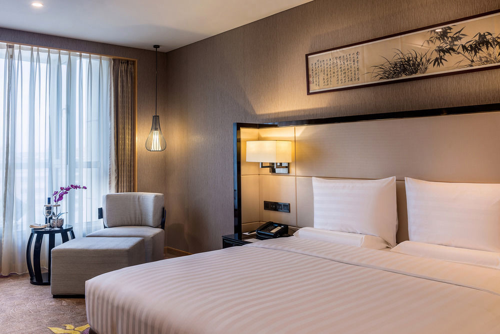 Готель Pullman Qingdao Ziyue Екстер'єр фото