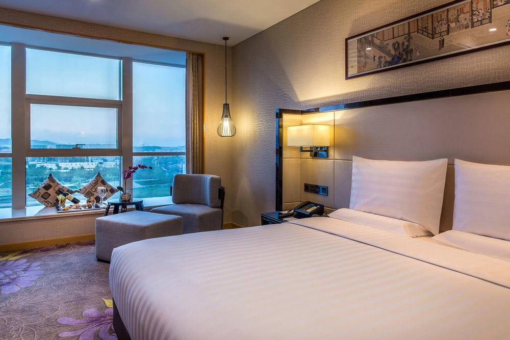 Готель Pullman Qingdao Ziyue Екстер'єр фото