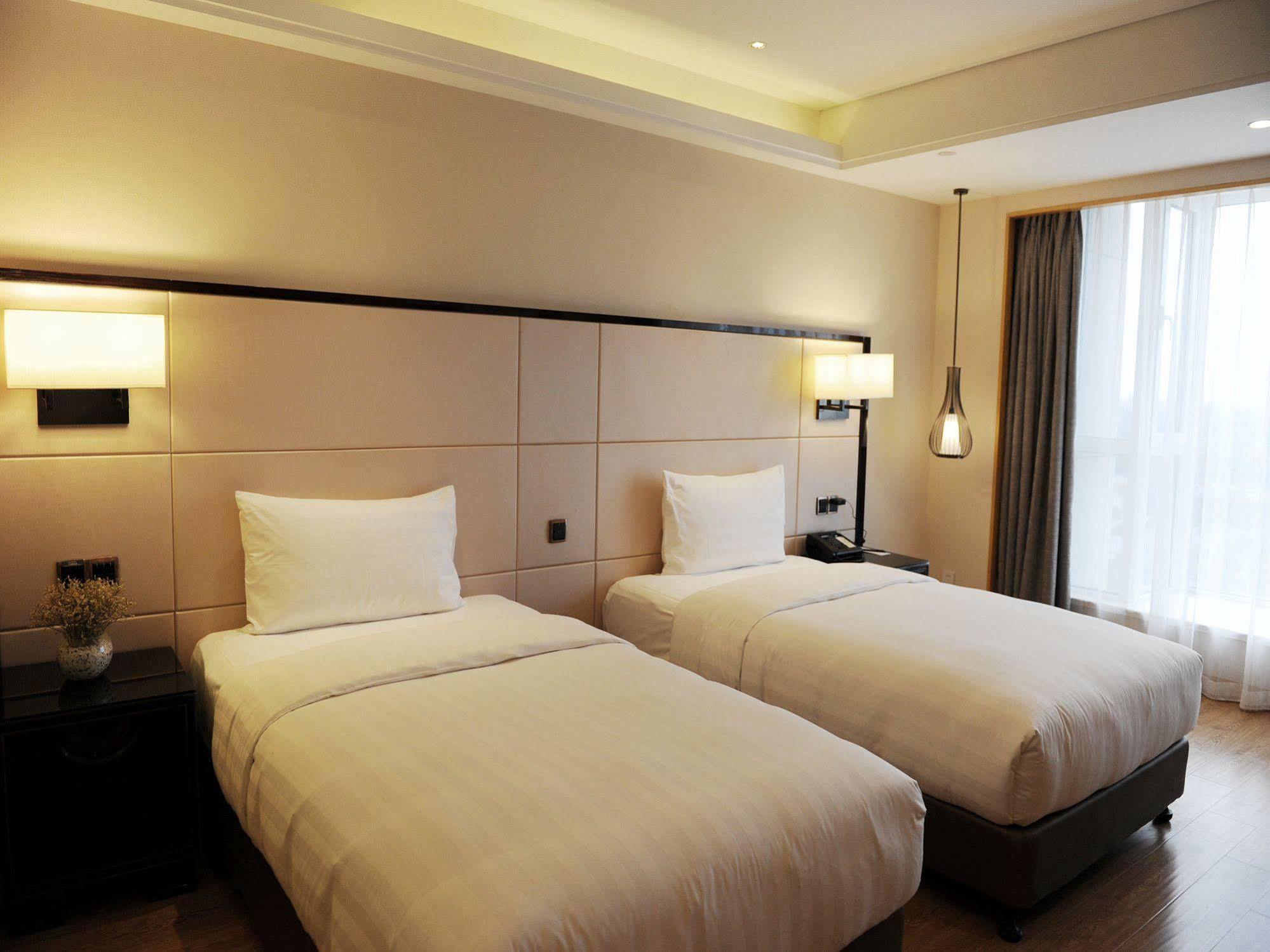 Готель Pullman Qingdao Ziyue Екстер'єр фото