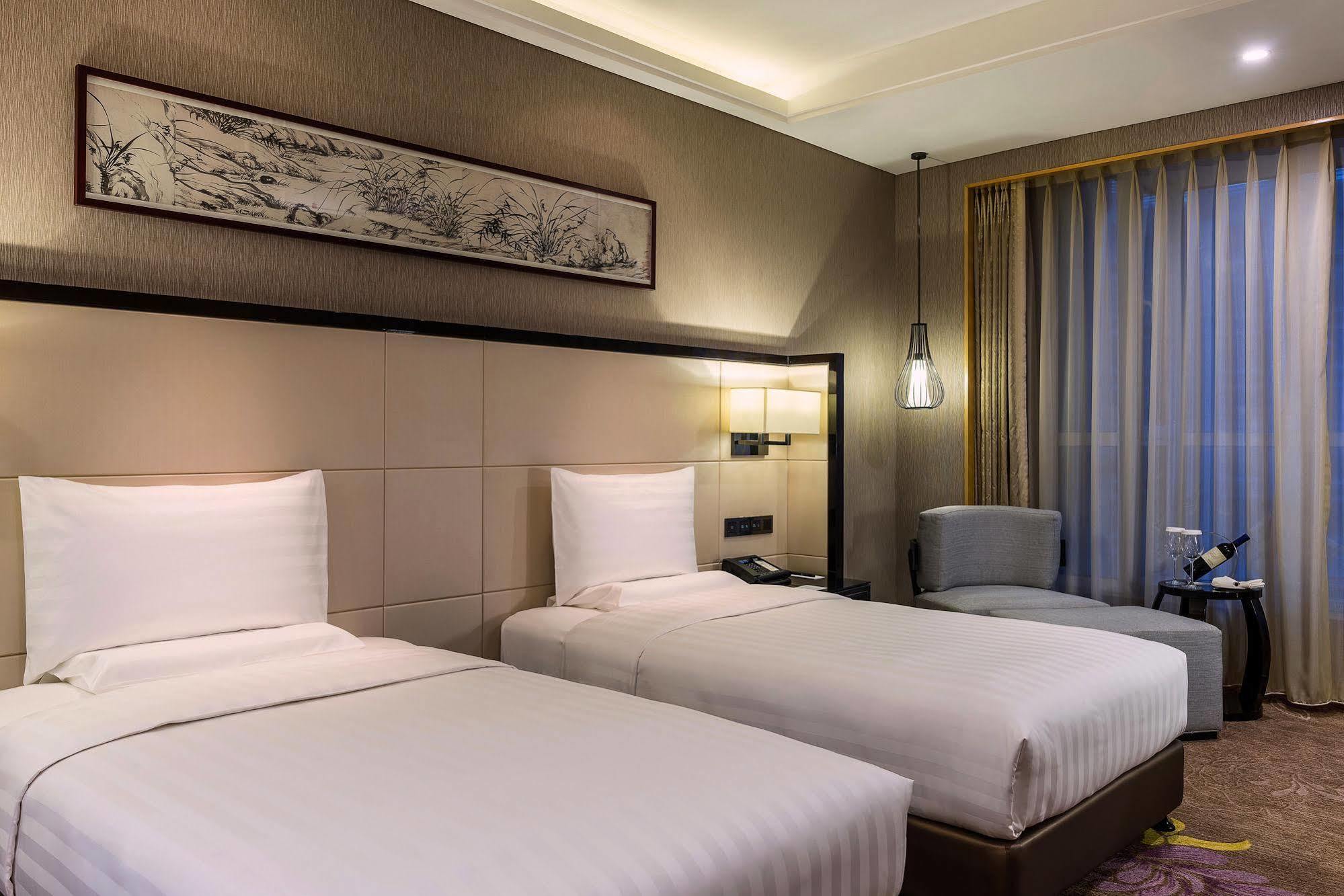 Готель Pullman Qingdao Ziyue Екстер'єр фото